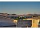 Expansive city and mountain view showing the neighborhood's attractive tile roofs and building design at 1103 Tektite Ave, Henderson, NV 89011