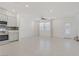 Open-concept living room showcasing a modern kitchen and spacious living area at 1103 Tektite Ave, Henderson, NV 89011