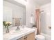 This bathroom includes a shower over tub and traditional vanity at 133 Park Ridge Ln, Henderson, NV 89002