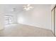 Spacious main bedroom with vaulted ceiling, ceiling fan, closet and balcony access at 133 Park Ridge Ln, Henderson, NV 89002