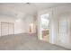 Large main bedroom featuring carpet flooring, ceiling fan, closet and ensuite bathroom access at 133 Park Ridge Ln, Henderson, NV 89002