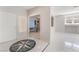 Bright entryway with decorative tile design and a view into a home office at 1363 Yeager Ave, Las Vegas, NV 89123