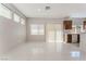 Open living area with large windows and sliding glass doors offering natural light and modern finishes at 1363 Yeager Ave, Las Vegas, NV 89123