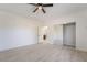 Spacious bedroom featuring light wood floors and a mirrored closet at 170 Story Ave, Pahrump, NV 89060