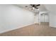 Cozy bedroom with ceiling fan and mirrored closet at 170 Story Ave, Pahrump, NV 89060