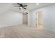 Bright bedroom with hardwood floors and a view of a bedroom through a doorway at 170 Story Ave, Pahrump, NV 89060
