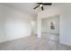 Bedroom with hardwood floors, closet with mirrored doors, and white walls at 170 Story Ave, Pahrump, NV 89060