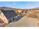 Aerial view of the property showcasing the garages and surrounding landscape at 170 Story Ave, Pahrump, NV 89060