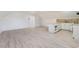 Bright living room with wood-look flooring and a stylish kitchenette at 170 Story Ave, Pahrump, NV 89060