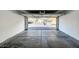 Interior view of an empty garage, highlighting the clean and spacious area at 1713 Queen Victoria St # 104, Las Vegas, NV 89144