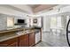 Spacious kitchen featuring breakfast nook and stainless steel dishwasher at 1713 Queen Victoria St # 104, Las Vegas, NV 89144