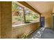 Outdoor patio with shade coverage overlooking a scenic hillside at 1713 Queen Victoria St # 104, Las Vegas, NV 89144
