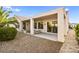 The backyard features a covered patio space with modern furniture, ideal for entertaining or relaxation at 2264 Savannah River St, Henderson, NV 89044
