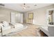 Bright bedroom featuring a lounge area, modern furniture, and direct access to the outside at 2264 Savannah River St, Henderson, NV 89044