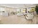 Bright, open living room with modern decor, hardwood floors, and a view to the outdoor landscape at 2264 Savannah River St, Henderson, NV 89044