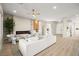Spacious living room featuring an electric fireplace, cozy furniture, and seamless flooring throughout at 2264 Savannah River St, Henderson, NV 89044