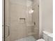 Detailed view of the modern glass shower with stylish tiling and convenient built-in niche at 2264 Savannah River St, Henderson, NV 89044