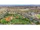 A panoramic view of a community park, baseball field, and clubhouse nestled within a vibrant neighborhood at 244 Native Stone St, Las Vegas, NV 89138