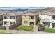 Aerial view of putting green backyard with mountain views at 244 Native Stone St, Las Vegas, NV 89138