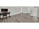 Loft area with wood-look floors featuring a desk and chair at 244 Native Stone St, Las Vegas, NV 89138