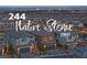 Scenic view of a well-planned community with similar architectural styles and a backdrop of the city skyline at 244 Native Stone St, Las Vegas, NV 89138