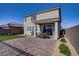 Wonderful backyard with desert landscaping, large patio, built-in grill, and great outdoor space for entertaining at 2581 Tolmezzo St, Henderson, NV 89044