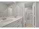 Bright bathroom featuring double sinks with chrome fixtures and a shower-tub combination at 2581 Tolmezzo St, Henderson, NV 89044