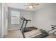 Exercise room featuring carpet floors, a ceiling fan, and fitness equipment at 2581 Tolmezzo St, Henderson, NV 89044