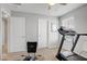 Exercise room featuring carpet floors, a ceiling fan, and fitness equipment at 2581 Tolmezzo St, Henderson, NV 89044