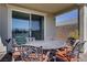 Inviting outdoor patio features dining set, covered area, and a view for relaxation and entertaining at 2581 Tolmezzo St, Henderson, NV 89044