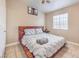 Cozy bedroom with a platform bed, natural light, and neutral color scheme create a relaxing atmosphere at 2620 Sierra Seco Ave # 101, Las Vegas, NV 89106