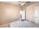 Neutral bedroom with a modern minimalist bed and soft lighting create a serene and inviting space at 2620 Sierra Seco Ave # 101, Las Vegas, NV 89106