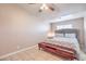 Comfortable bedroom featuring neutral colors and tiled floors at 2620 Sierra Seco Ave # 101, Las Vegas, NV 89106