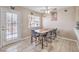 Bright dining area featuring a table with seating for four near a window at 2620 Sierra Seco Ave # 101, Las Vegas, NV 89106