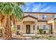 Charming townhome featuring a cozy front porch, desert landscaping, and a welcoming entrance at 2620 Sierra Seco Ave # 101, Las Vegas, NV 89106