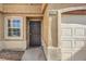 Inviting townhome entrance with secure front door and attached garage at 2620 Sierra Seco Ave # 101, Las Vegas, NV 89106