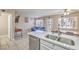Bright kitchen featuring a double stainless steel sink and modern appliances at 2620 Sierra Seco Ave # 101, Las Vegas, NV 89106
