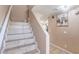 Well-lit staircase with tile steps and modern lighting fixture at 2620 Sierra Seco Ave # 101, Las Vegas, NV 89106