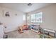 Cheerful bedroom designed with toddler bed and toy storage, perfect for young children at 2657 Fawn Beige Ct, North Las Vegas, NV 89086