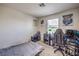 Neat bedroom designed with gray gamer chair and PC, perfect for teens or gamers at 2657 Fawn Beige Ct, North Las Vegas, NV 89086