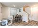 Charming dining area with seating for four and stylish decor at 2657 Fawn Beige Ct, North Las Vegas, NV 89086