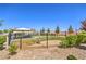 Community dog park with shaded bench and plenty of room for pets to play and socialize at 2657 Fawn Beige Ct, North Las Vegas, NV 89086