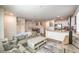 Open-concept living room that flows into the kitchen and dining area at 2657 Fawn Beige Ct, North Las Vegas, NV 89086