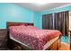A cozy bedroom featuring ample natural light and neutral decor at 2809 Webster St, North Las Vegas, NV 89030