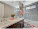 Beautiful bathroom featuring a double sink vanity, large mirror, and walk-in shower at 2885 Red Springs Dr, Las Vegas, NV 89135