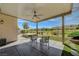 Charming outdoor space with seating area, ceiling fan, and view of the golf course and desert landscape at 2885 Red Springs Dr, Las Vegas, NV 89135