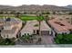 Stunning single-Gathering home featuring a desert landscaped yard, a tile roof, and an attached two-car garage at 2885 Red Springs Dr, Las Vegas, NV 89135