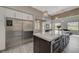 Spacious kitchen equipped with stainless steel appliances, quartz countertops, and a large center island at 2885 Red Springs Dr, Las Vegas, NV 89135