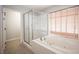 This bathroom features a shower with glass doors and a large soaking tub with jets at 3025 Yankee Clipper Dr, Las Vegas, NV 89117
