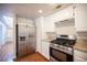 Functional kitchen equipped with stainless steel appliances, gas range, and ample storage space at 3025 Yankee Clipper Dr, Las Vegas, NV 89117